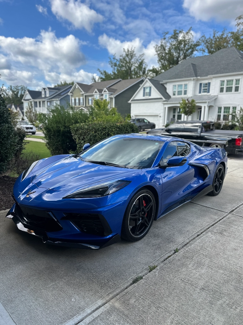 windows tinted of blue sports car by Eternal Shade NC