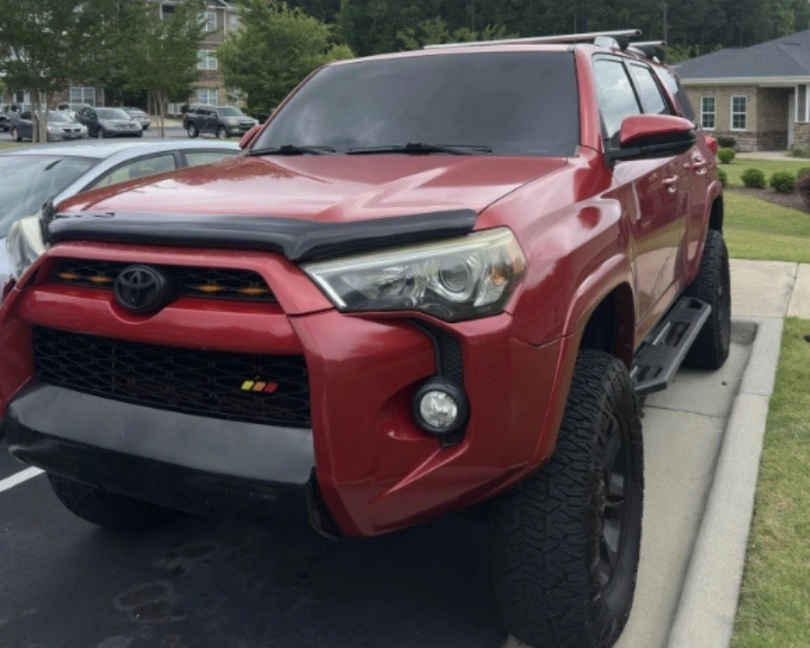 red truck detailed and tinted by Eternal Shade NC