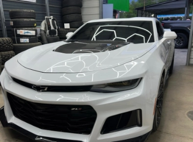 mobile window tinting on a white car